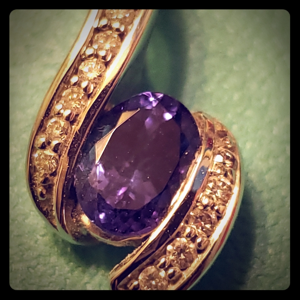Tanzinite and diamond pendant